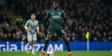 Deep-lying playmaker surveying the field in a modern soccer match