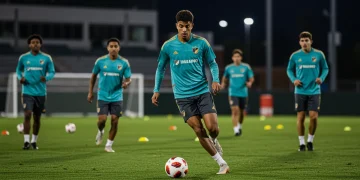 Young MLS academy players training on a vibrant green pitch, showcasing skill and determination.
