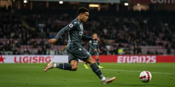 Modern wing-back attacking on the flank, delivering a cross in a 2025 football match.