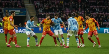 Soccer players executing a high counter-press after losing possession, showing coordinated defensive effort.