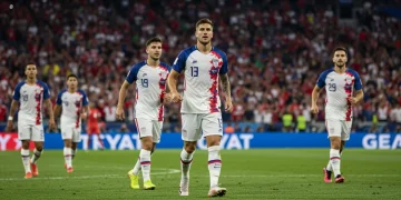 USMNT 2026 World Cup Qualifiers: Tactical Formations & Player Roles USMNT players in action during a World Cup Qualifier match, showcasing evolving tactical formations