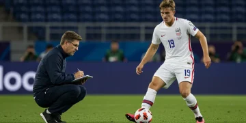 Soccer scout evaluating an American defender's performance during a match for the 2026 draft
